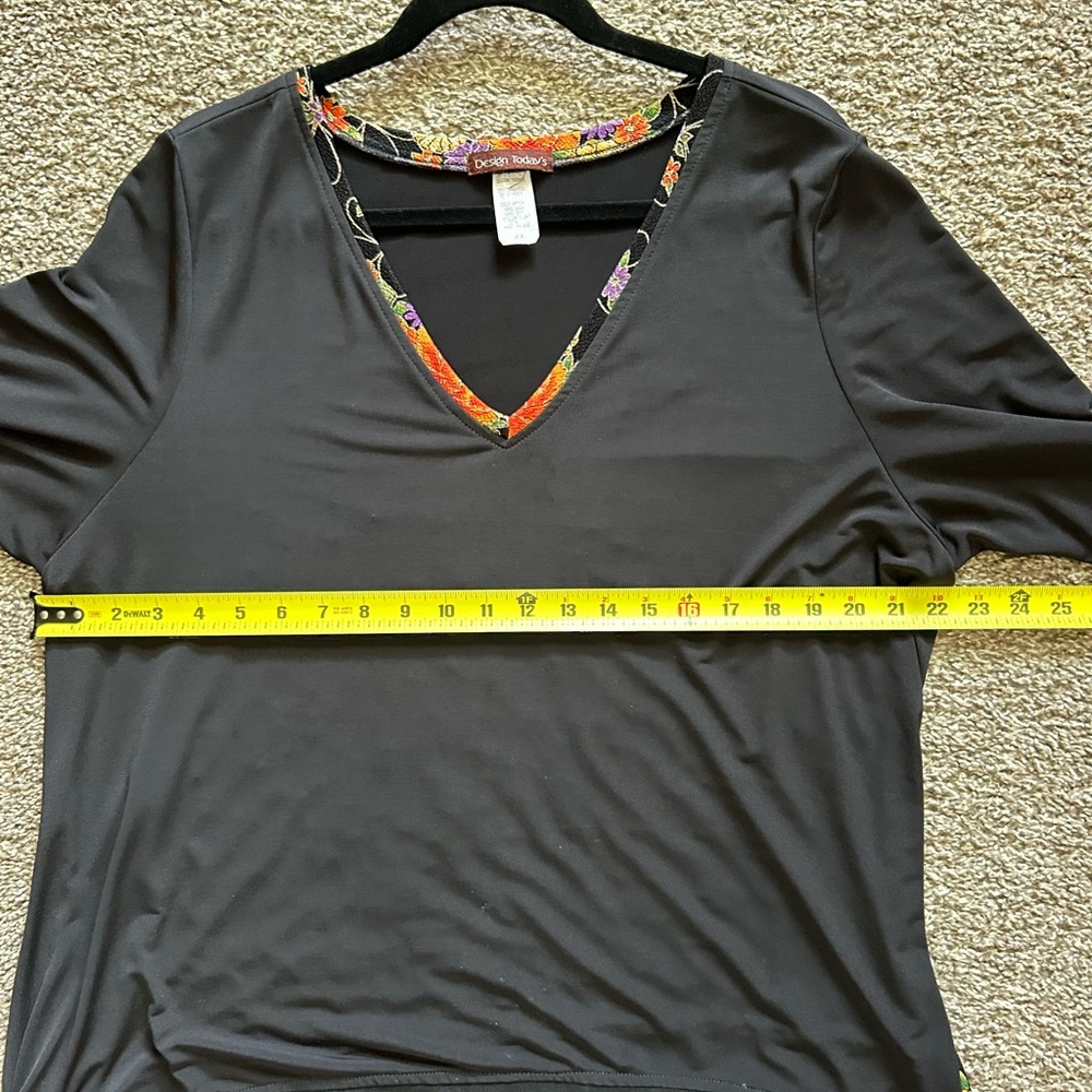 Black top with floral trim. - Picture 8 of 9